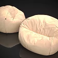 Two Cozy Beige Fabric Bean Bag Chairs For Comfortable Home Living Room