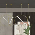 Modern Circular Pendant Lights With Gold Frames LED Strips In Minimalist Interior With Green Plant