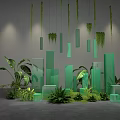 Art Installation With Hanging Green Plants Green Geometric Structures Ground Plants And Gray Wall Lighting