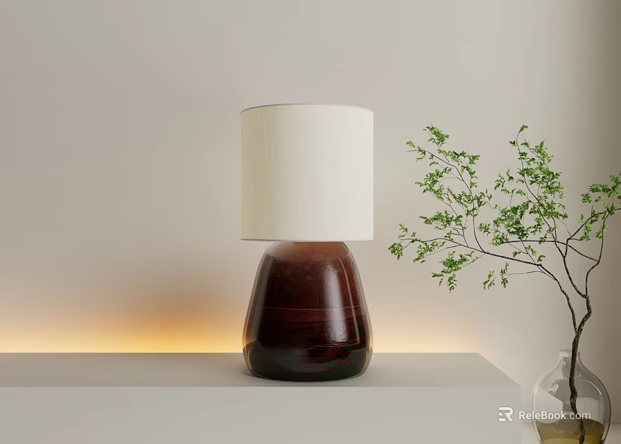 Modern Table Lamp with White Lampshade and Dark Base on Light Tabletop with Green Plant 3d model 