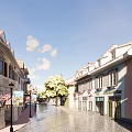 European Style Commercial Street With Plaza Greenery Fountains And Traditional Buildings