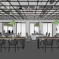 Modern Open Public Office Space With Long Tables Pendant Lights Green Plants Bookshelves Large Windows