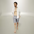 Man Walking Barefoot In Open White Shirt And Gray Shorts Against Simple Light Background