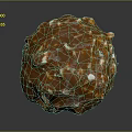 Caramel Colored Nutty Candy Ball with Glossy Texture and Crunchy Nut Pieces