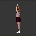 Woman Doing Yoga Single Leg Standing With Hands Raised In Pink Sports Bra Maroon Shorts