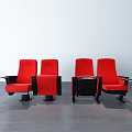 Red Theater Style Public Chairs With Armrests And Cup Holders On Dark Floor