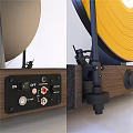 Gold Vinyl Record On Turntable With Wooden Base Black Panel And Tonearm
