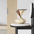 Ceramic Vase On Chair With White Cushion Black Frame Light Wooden Door White Wall