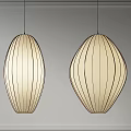 Two Modern Oval Striped Beige Pendant Lights Hanging On Gray Wall With Frame