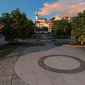 Residential Building Complex With Plaza Trees Circular Paved Ground And Sunset Sky