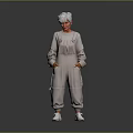 Elderly Person With White Hair Standing In Light Gray Jumpsuit Hands In Pockets White Shoes