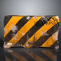 Worn Road Barrier Block With Yellow Black Diagonal Stripes And Graffiti