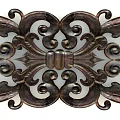 Intricate Artistic Carving In Metallic Material With Symmetrical Curled Patterns And Decorative Design Elements