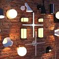 Various Stylish Wall Lamps With Diverse Designs Mounted On Red Brick Wall And Illuminated Features