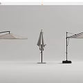 Various Styles Of Outdoor Umbrellas With Different Stand Designs And Canopy Colors