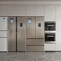 Modern Kitchen Interior With Stainless Steel Refrigerators And Freezers In Built In Cabinets