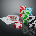 Colorful Casino Chips Stacked with Playing Cards on Black Table for Card Game Entertainment