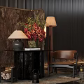 Elegant Black Round Console Table With Floral Arrangement Crane Patterned Backdrop And Table Lamp