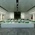 Modern Exhibition Hall With White Display Counters And Green Packaged Products On Show