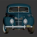 Vintage Blue Classic Car With Sleek Body Design And White Wall Tires