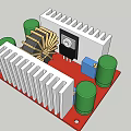Electronic Circuit Board Assembly With Red Base Green Capacitors Heat Sinks And Inductor Coil