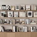 Books and Magazines Neatly Arranged on Wooden Bookshelves with Various Covers and Decorative Items
