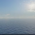 Beautiful Bright Sunny Seascape With Calm Blue Ocean Clear Sky And Distant Offshore Oil Platforms