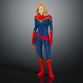 Female Superhero With Blonde Hair In Blue Costume Red Gloves Red Boots And Red Cape