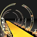 Elegant Event Entrance with Yellow Carpet Arched Decorations Lighting and Flowers