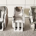 Three Modern Massage Chairs With Unique Designs In Interior Environment 3d model