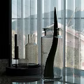 Gray Tray With Transparent Glassware White Candles And Glass Jar On Marble Countertop
