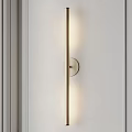 Modern Minimalist Wall Lamp On White Paneled Wall With Warm Illumination And Circular Metal Base