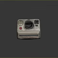 Vintage Polaroid Camera With Classic White Body And Red Button Design