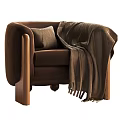 Brown Velvet Armchair with Wooden Legs Pillow and Fringe Blanket