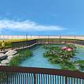 Park Landscape With Lotus Pond Walking Path Railing And Greenery Under Blue Sky
