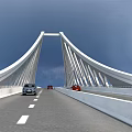 Modern White Cable Stayed Bridge With Cars Driving On Road Under Clear Blue Sky