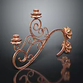 Elegant Copper Candlestick With Plant Motifs And Three Candle Holders On Black Background