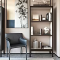 Modern Wooden Bookcase With Books Decorative Sculpture And Bamboo Painting Near Black Leather Chair