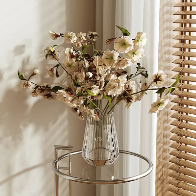 Clear Glass Vase With White Pink Blossoms On Circular Metal Side Table 3d model