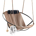 Woven Hanging Leisure Chair With Black Frame Cushion Gray Towel And Wooden Ball