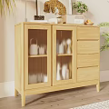 Cozy Living Room With Rattan Chair Plants And Wooden Cabinet