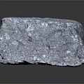 Transparent Triangular Stone With Natural Texture And Reflective Surface On Dark Background