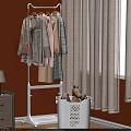 White Clothes Rack with Hanging Coats Dresses near Laundry Basket Stuffed Toys Orange Wall Curtain
