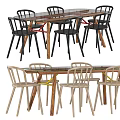 Modern Dining Table Set With Wooden Top Black Light Colored Chairs Red Yellow Accents