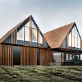 Modern Single Family House With Triangular Roof Large Glass Windows And Grassland Surroundings
