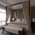 Elegant Four-Poster Double Bed in Bedroom with Beige Curtains Golden Bedding Bedside Tables and Bench