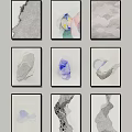 Abstract Artworks With Various Designs In Black Frames Arranged As Wall Decor