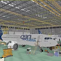 Inside Airport Maintenance Hangar With Airbus Aircraft And Repair Equipment