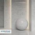Minimalist Modern Marble Sphere Structure With White Marble Walls And Soft Lighting