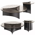 Modern Round Coffee Table With Textured Surface And Black Base Design